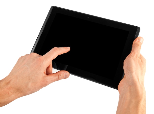 Tablette sur une surface blanche