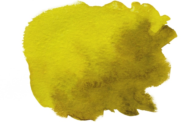 Tache d'aquarelle jaune colorée sur une surface blanche