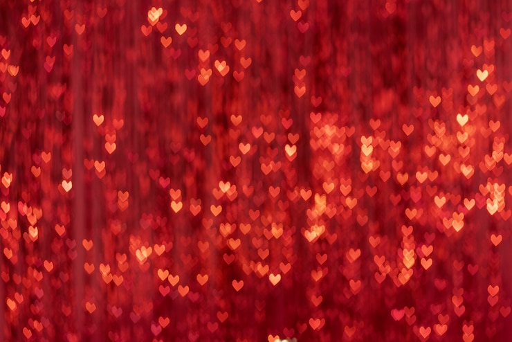 Taches brillantes en forme de coeur Bokeh background Le rideau décoratif en flou