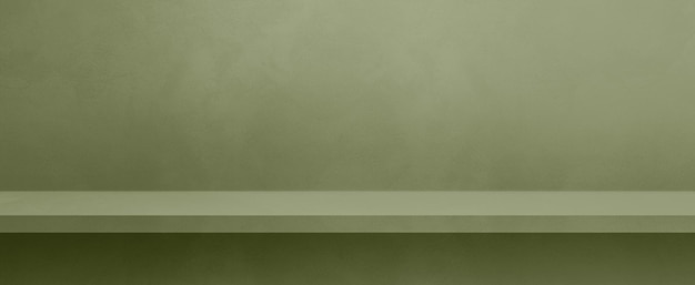 Étagère vide sur un mur de béton vert kaki Modèle d'arrière-plan Maquette de bannière horizontale
