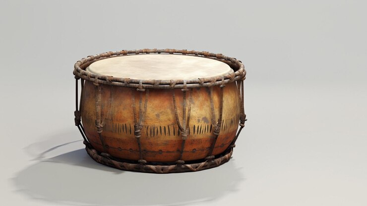 Photo un tambour avec un manche en bois et un fond blanc