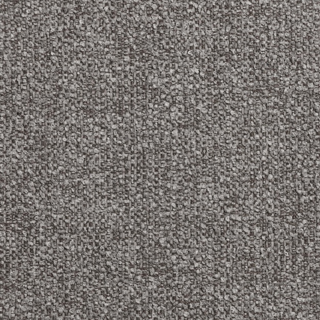 Photo un tapis gris avec un motif texturé du tissu fabriqué par la société wool.