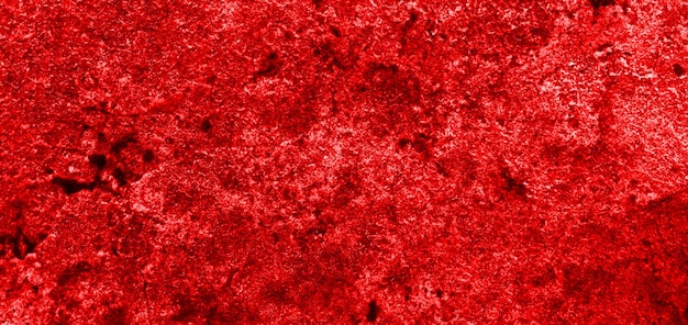 Un tapis rouge avec un fond noir et un fond noir.