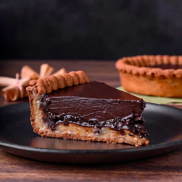 La tarte au chocolat, le désert, le bown, le sucre, la nourriture organique, le fond de la fête d'anniversaire.
