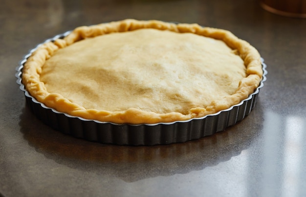 Tarte aux blettes, prête à cuire au four. Recette pas à pas.