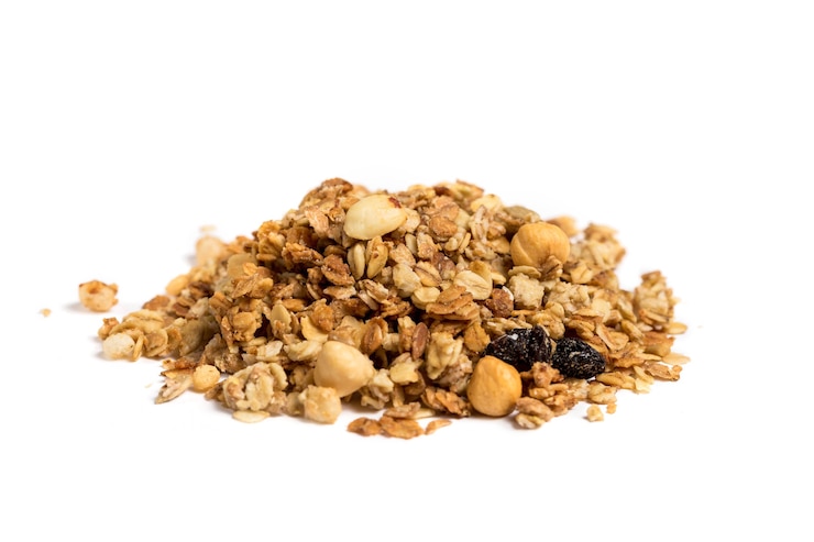 Photo tas de granola isolé.
