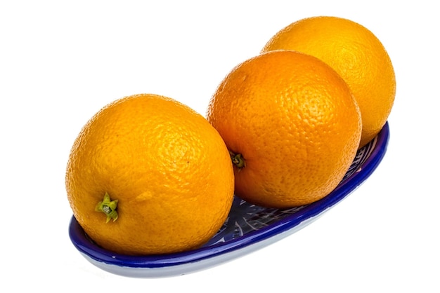 Tas d'oranges dans le plat