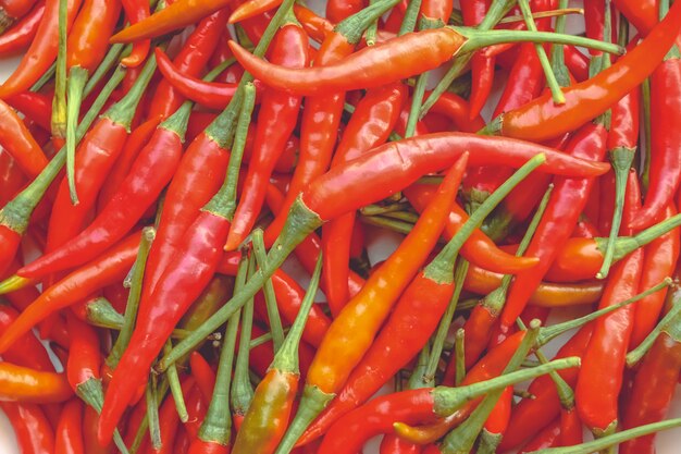 Tas de piments rouges fond