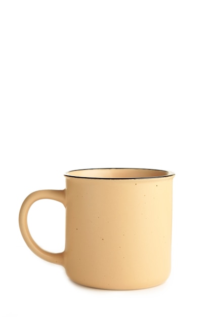 Tasse beige isolée sur fond blanc. Vue de dessus