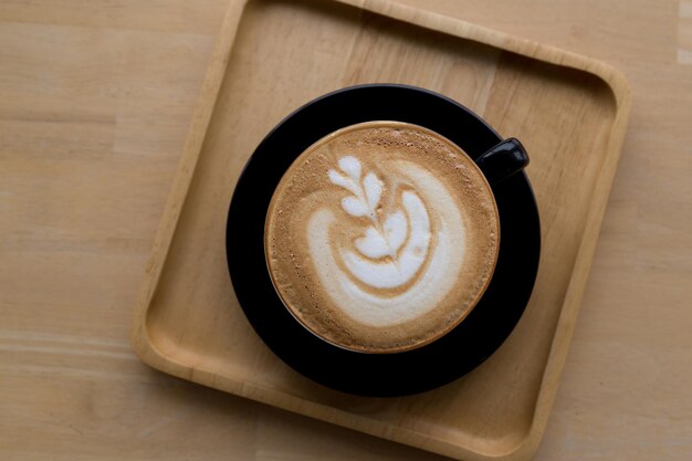 Photo une tasse de café sur la table.