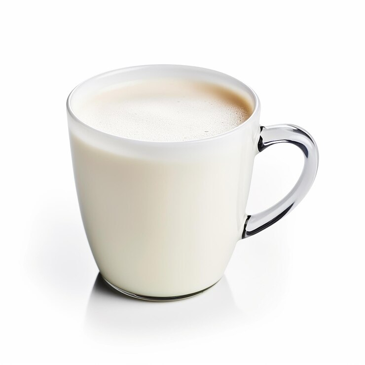 Photo une tasse de lait avec une poignée sur le côté
