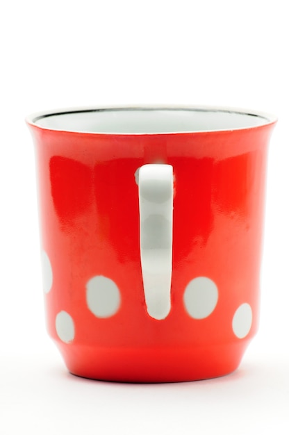 Tasse rouge vintage avec pois blancs