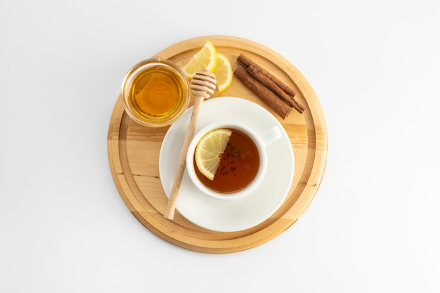 Tasse à Thé Au Citron Et Au Miel Sur Fond Blanc