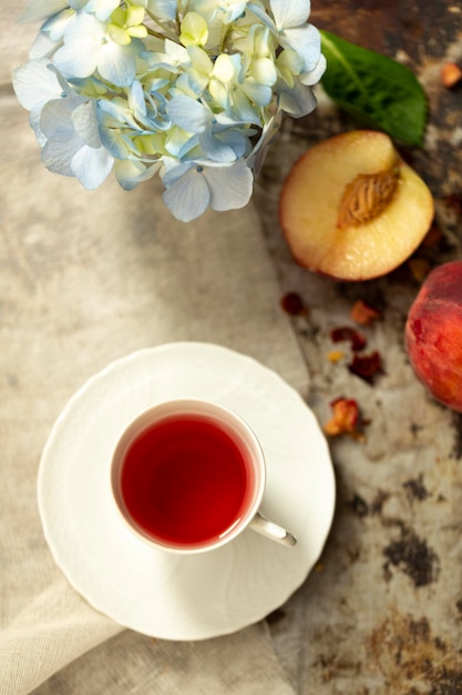 Tasse de thé saveur pêche