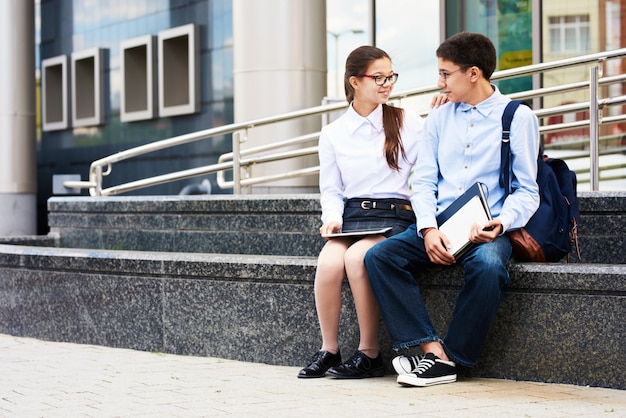 Teenage Couple in School Yard