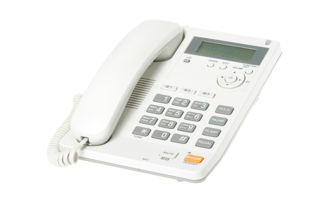 Téléphone de bureau blanc sur fond blanc