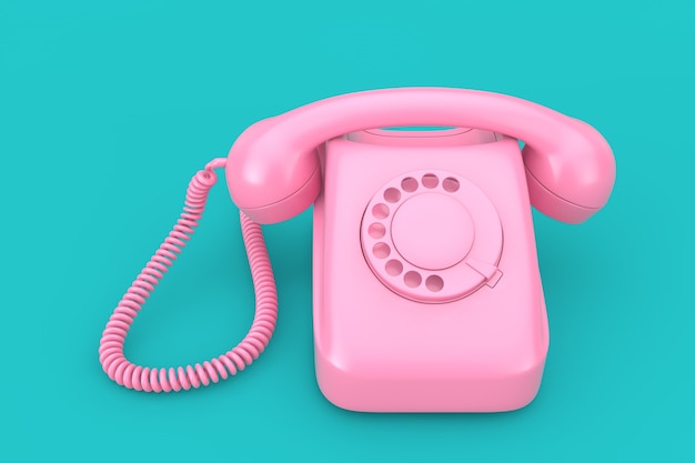 Téléphone à cadran de style vintage rose sur fond bleu rendu 3d