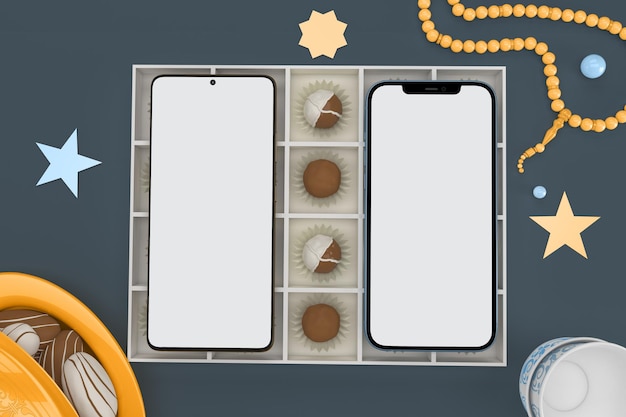 Téléphones intelligents et vue de dessus de boîte de chocolat dans un arrière-plan sur le thème de l'Aïd