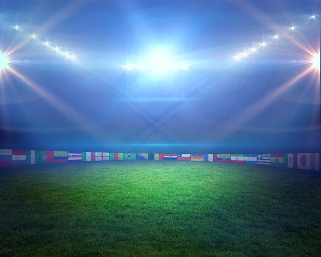 Photo terrain de football avec des lumières et des drapeaux