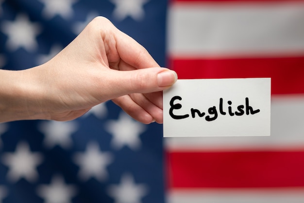 Photo texte anglais sur une carte. surface du drapeau américain.