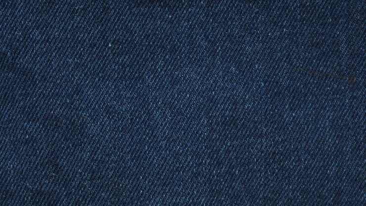 Photo textile de jeans bleu indigo pour la texture et l'arrière-plan.