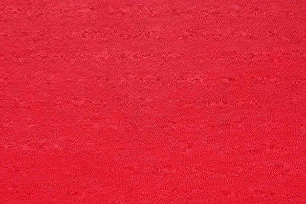 Texture abstraite rouge pour le fond. Gros plan sur la macrophotographie détaillée du matériau de décoration de texture, la conception de fond de motif pour la brochure, l'affiche, le livre de couverture et le catalogue.