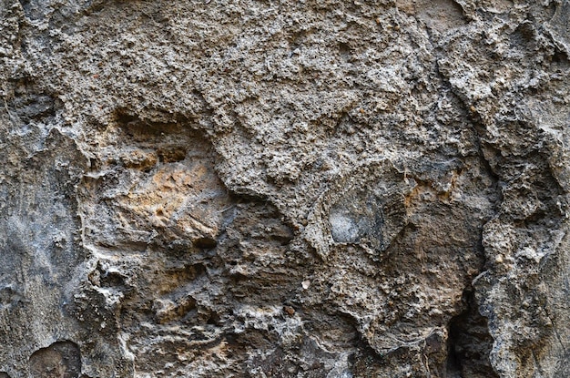 La texture de l'ancien mur patiné grunge rugueux