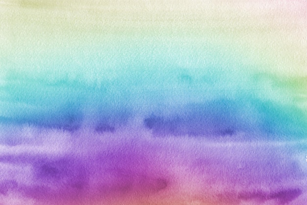 Texture aquarelle arc-en-ciel coloré peinte sur fond de papier