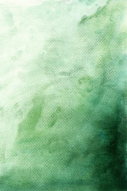 Photo texture aquarelle dégradé vert sur fond de papier dans des couleurs sombres et claires