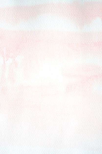 Texture aquarelle rose sur fond de papier blanc