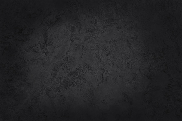 Texture d'ardoise noire gris foncé avec mur en pierre naturelle haute résolution.