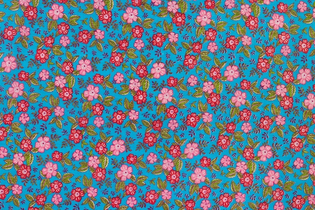 Texture d'arrière-plan tissu bleu motif floral.
