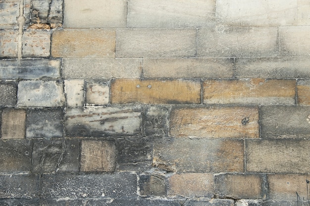 Photo texture d'arrière-plan vieux mur de pierre grise