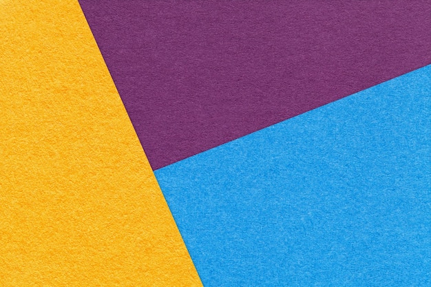 Texture de l'artisanat jaune violet et bleu ombre couleur papier fond macro Vintage carton abstrait