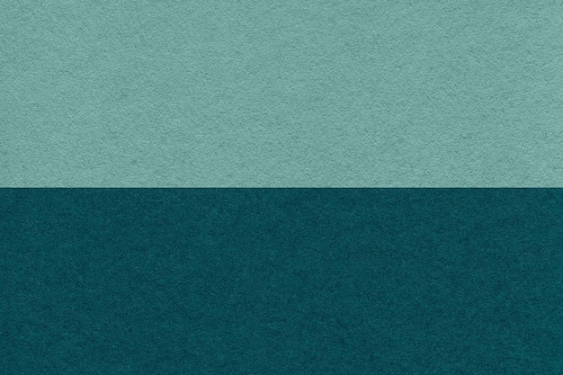 La texture de l'artisanat papier cyan foncé et émeraude fond demi-deux couleurs macro Structure de vintage carton sarcelle dense