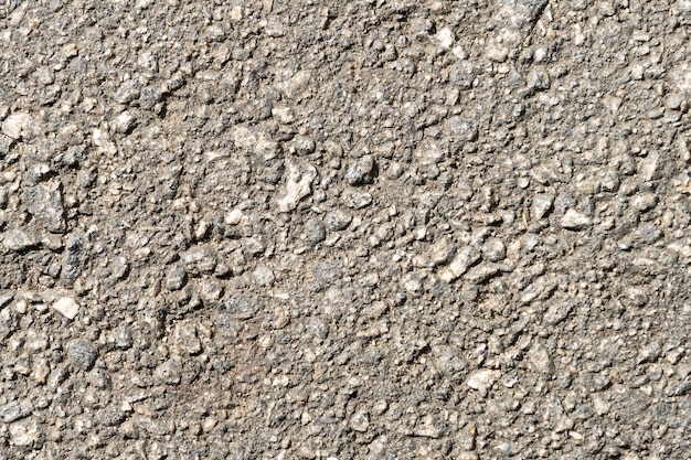 Texture d'asphalte gris avec lumière incidente