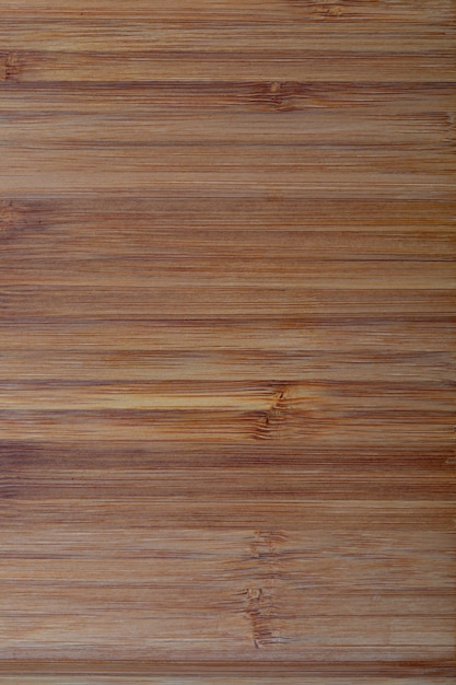 Texture de bambou rustique. Lignes horizontales. Ton ocre et marron.