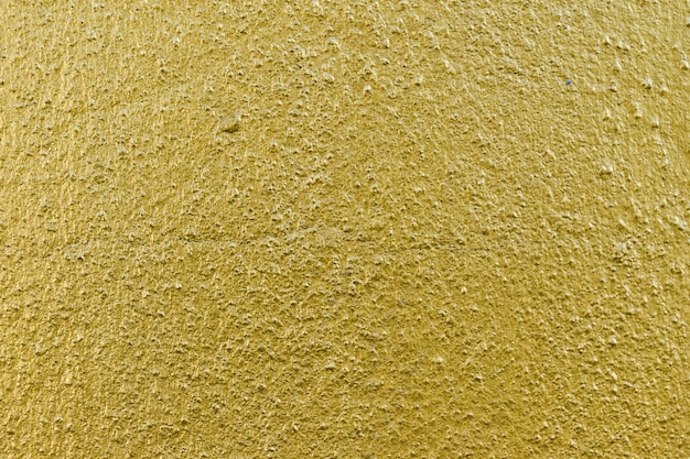 Texture béton mur doré