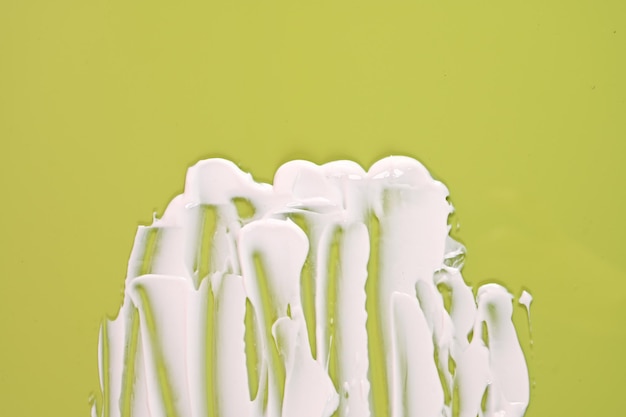 Texture blanche de fond crème Frottis exclusifs de produits cosmétiques Vue de dessus avec espace de copie Photo de haute qualité