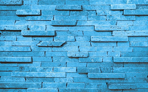 Texture bleue du mur de pierre. Fond de blocs de travertin de haute qualité