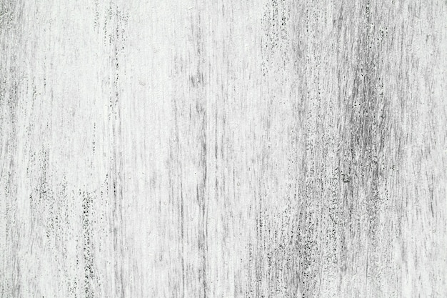 Texture bois clair recouvert de peinture blanche vue de dessus (gros plan)