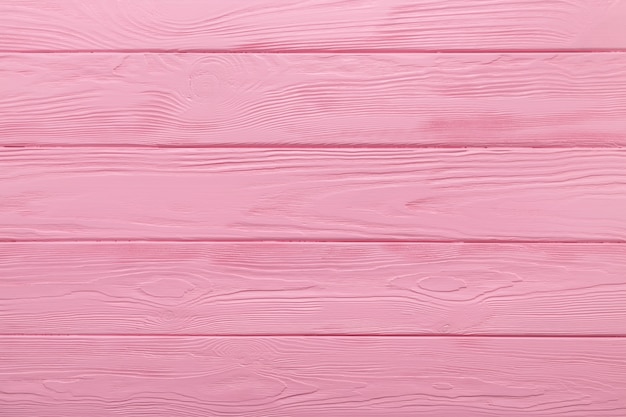 Texture en bois ou fond de table rose pastel