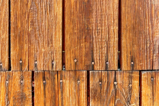 Texture bois grunge Fond de mur en bois brun brut Construction de bâtiments de village