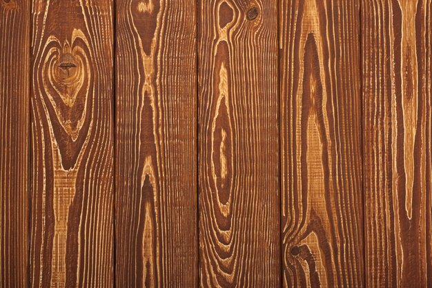 Texture de bois vieux brun avec noeud