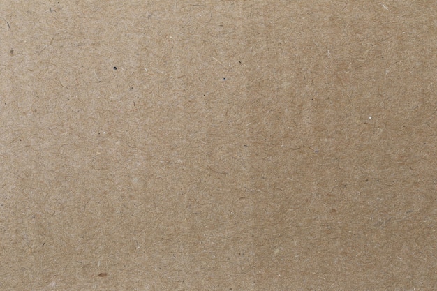 Texture de la boîte de papier brun ou du carton pour le fond de conception.