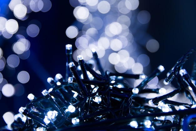 Texture de bokeh de lumières bleues. Lumières de Noël estompées