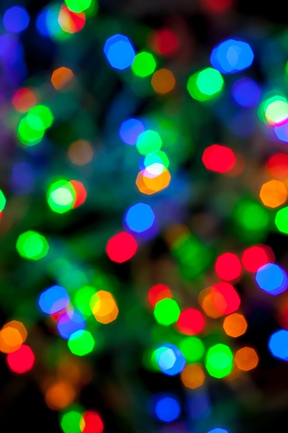 Texture bokeh des lumières multicolores de noël et du nouvel an