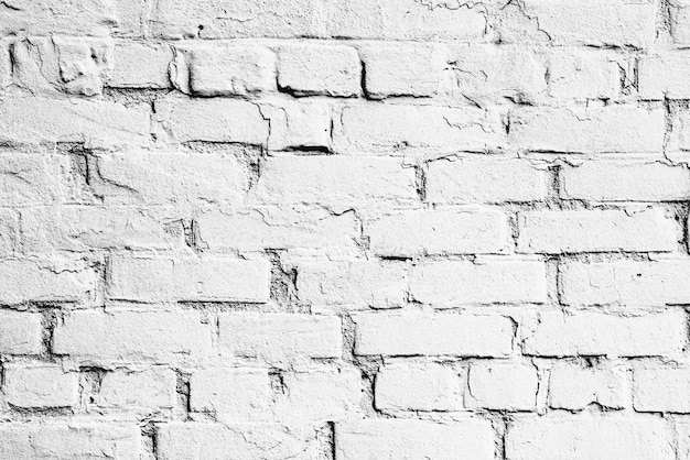 Texture, brique, fond de mur. Texture de brique avec rayures et fissures