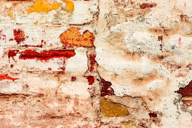 Texture, brique, fond de mur. Texture de brique avec des rayures et des fissures