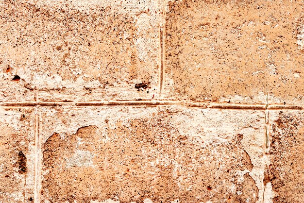 Texture, brique, mur, il peut être utilisé comme arrière-plan. Texture de brique avec des rayures et des fissures